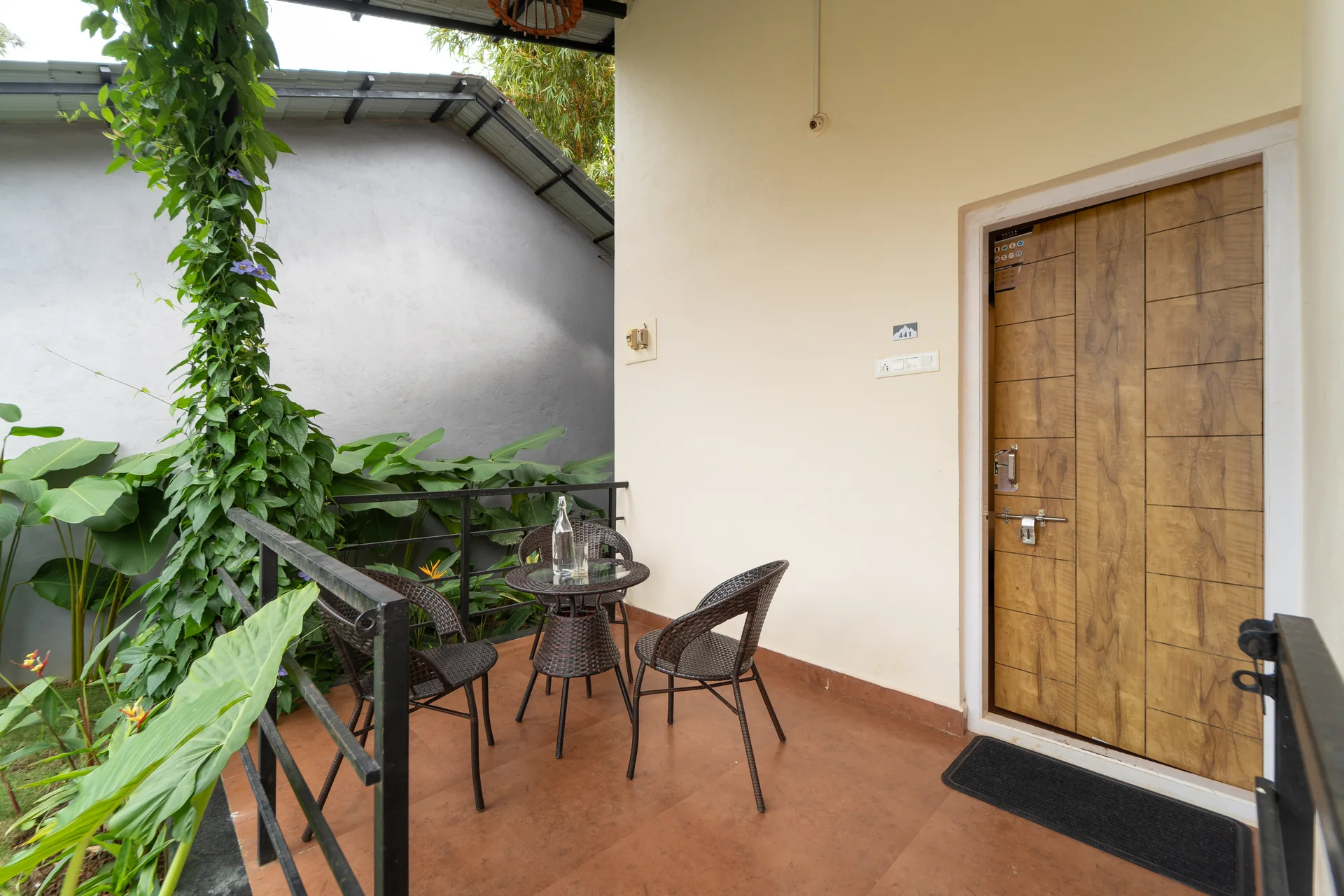 Deluxe Cottage veranda seating at Nadi Teera, Dandeli