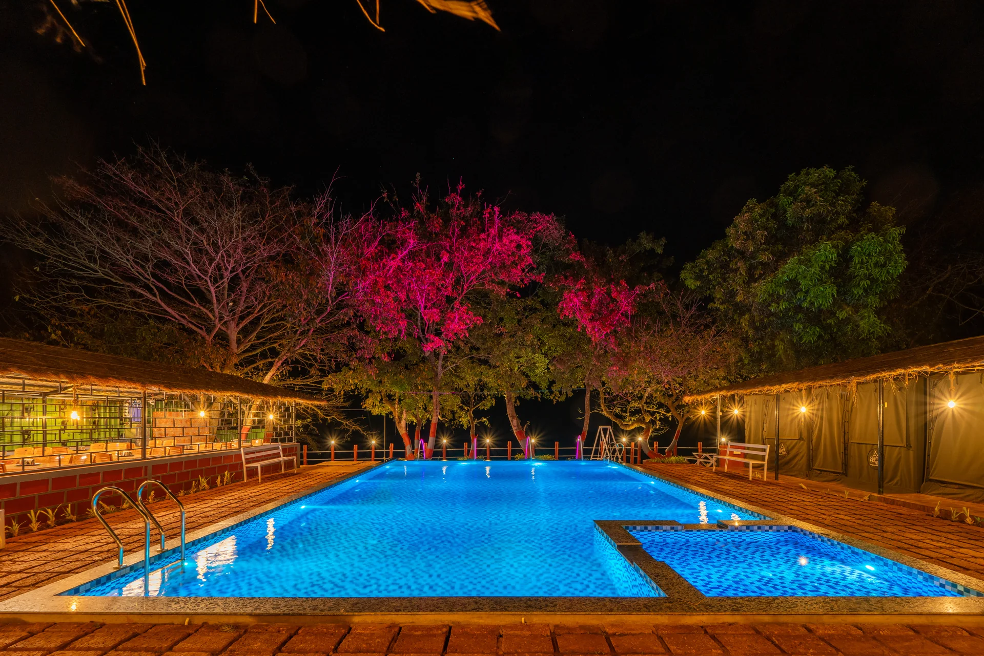 The pool after dark at Nadi Teera, Dandeli