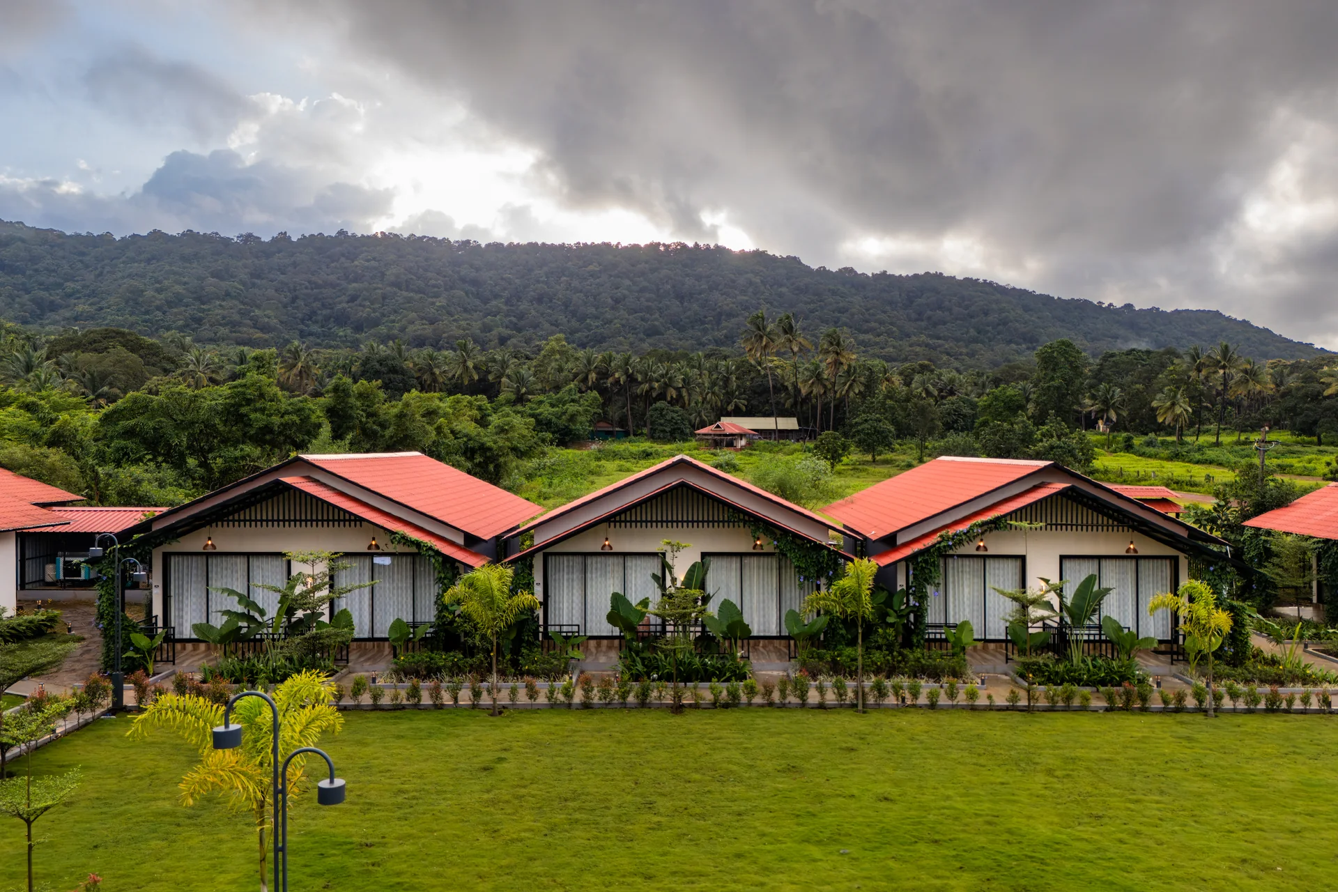 Cottages at the foot of the hills at Nadi Teera, Dandeli