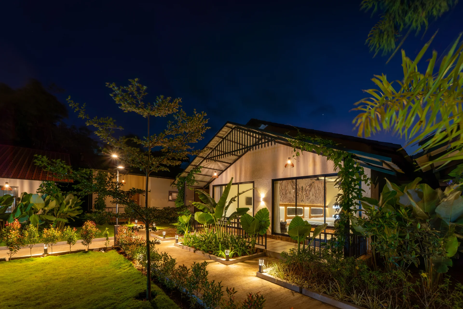 A quiet cottage after dark at Nadi Teera, Dandeli
