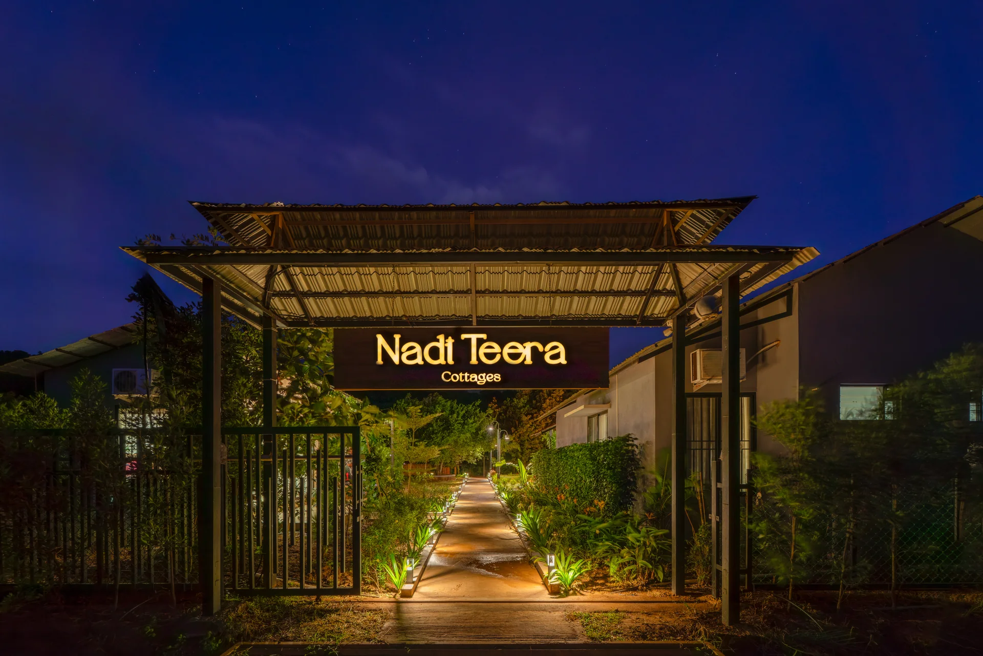 The illuminated Nadi Teera entrance at Nadi Teera, Dandeli