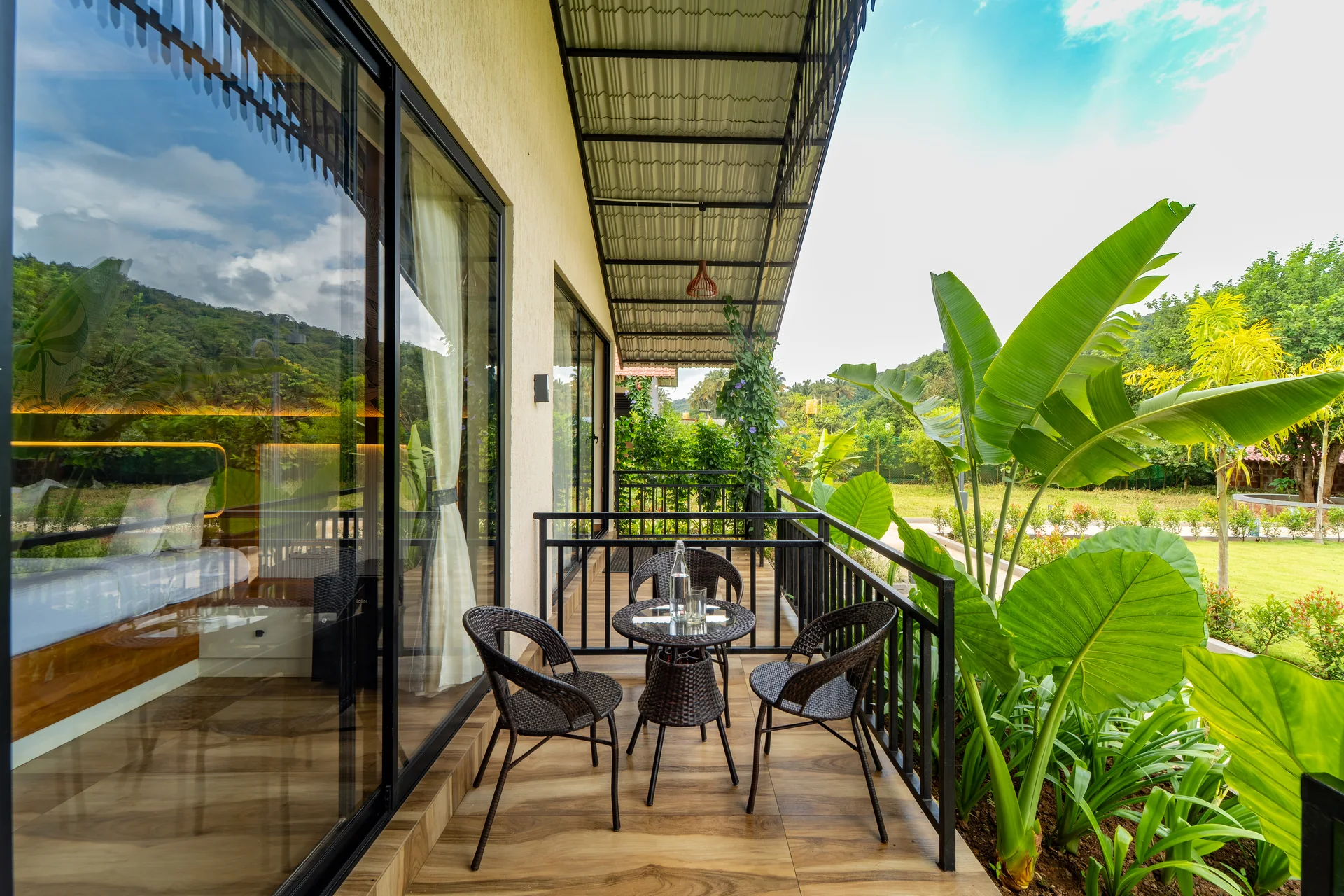 Premium Cottage balcony seating at Nadi Teera, Dandeli